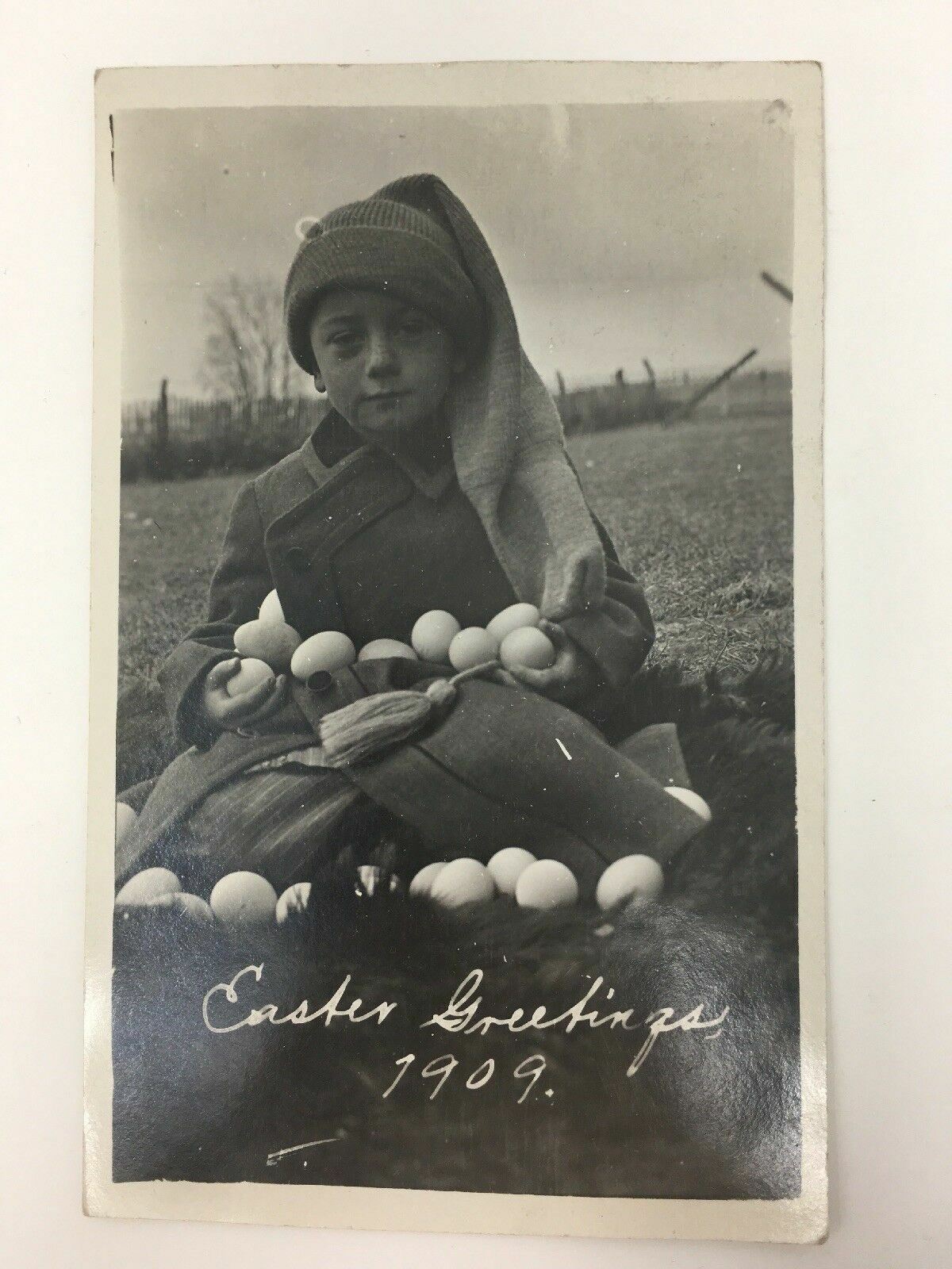 1909 Easter Real Photo Postcard Boy in Field Holding Eggs RPPC AZO