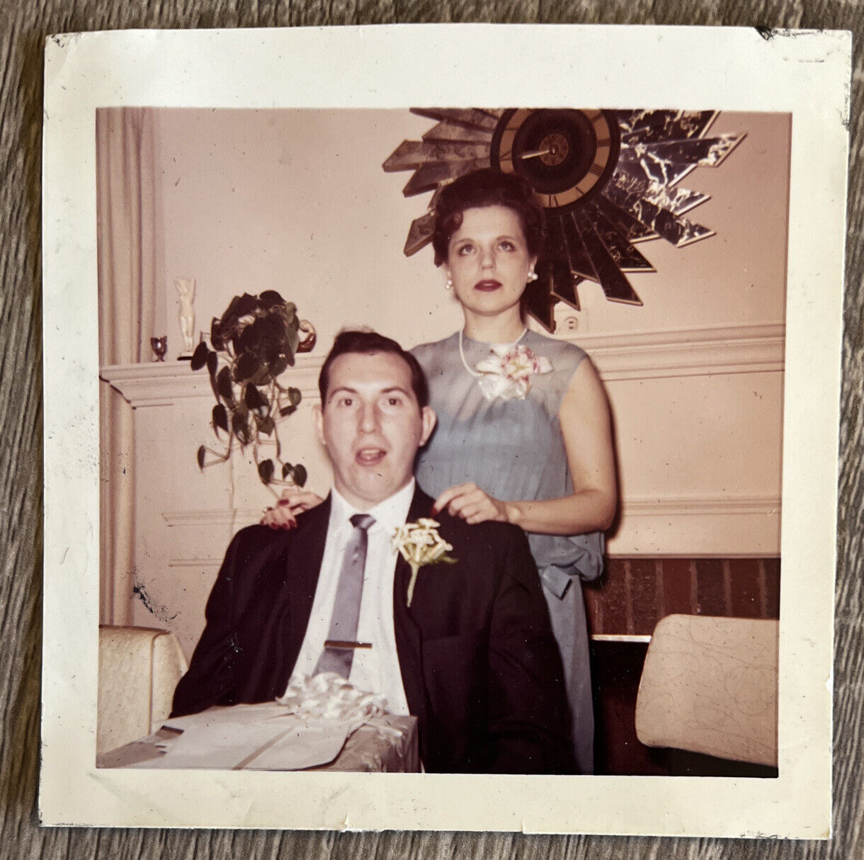 1960s Found Photo Snapshot Well Dressed Couple Poses at Party Woman Rolls Eyes