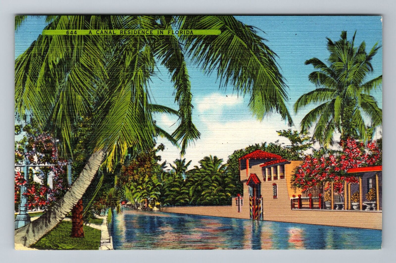 FL-Florida A Tropical Canal Residence Trees & Plants Vintage Souvenir Postcard