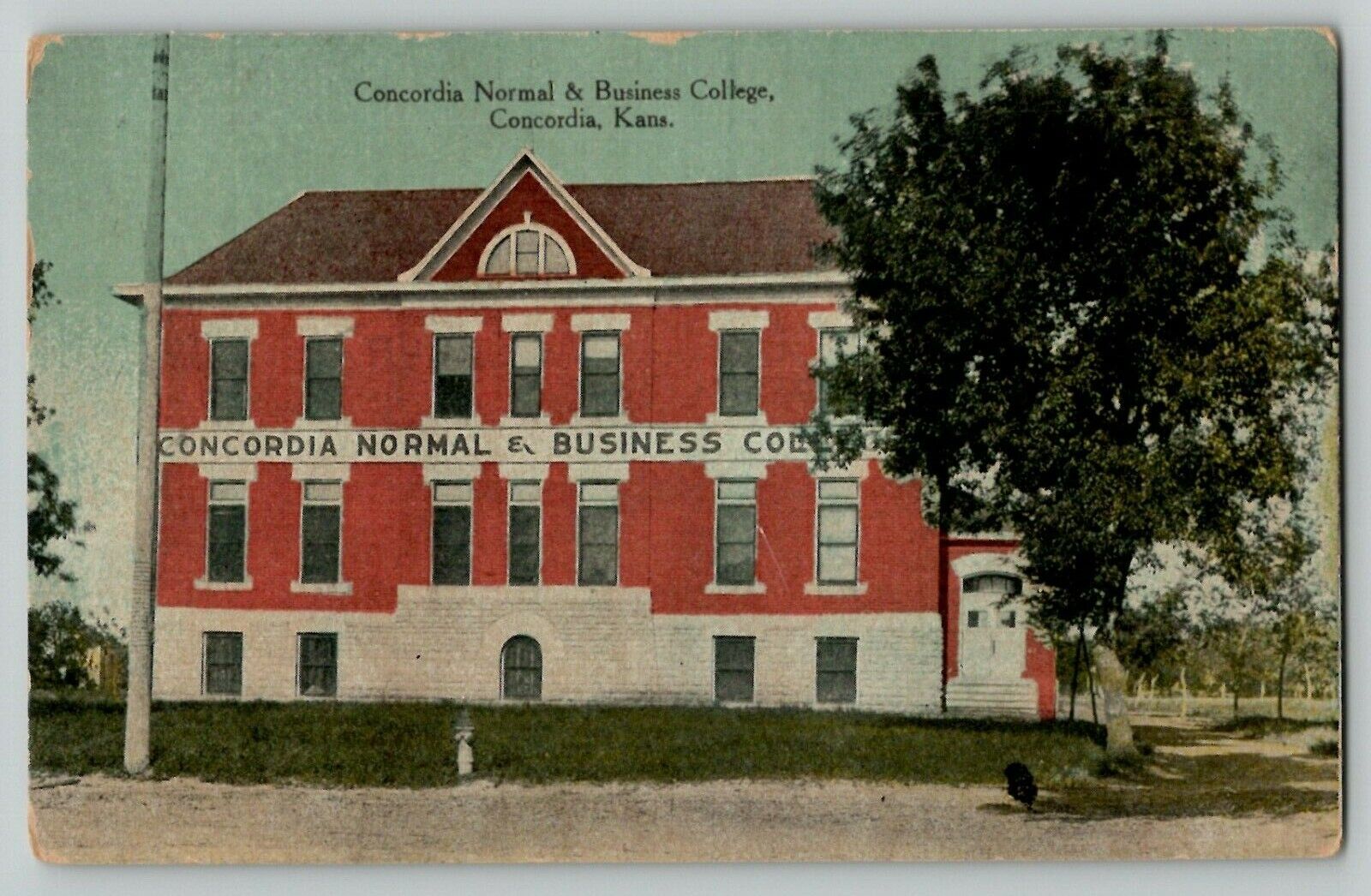 1916 Concordia Normal & Business College KS Street Scene Vintage postcard