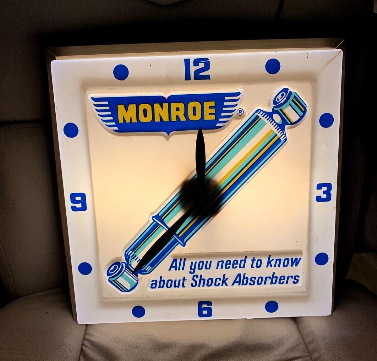 Vintage Monroe Shock lighted Clock Sign Oil Gasoline Service Station 15 inch