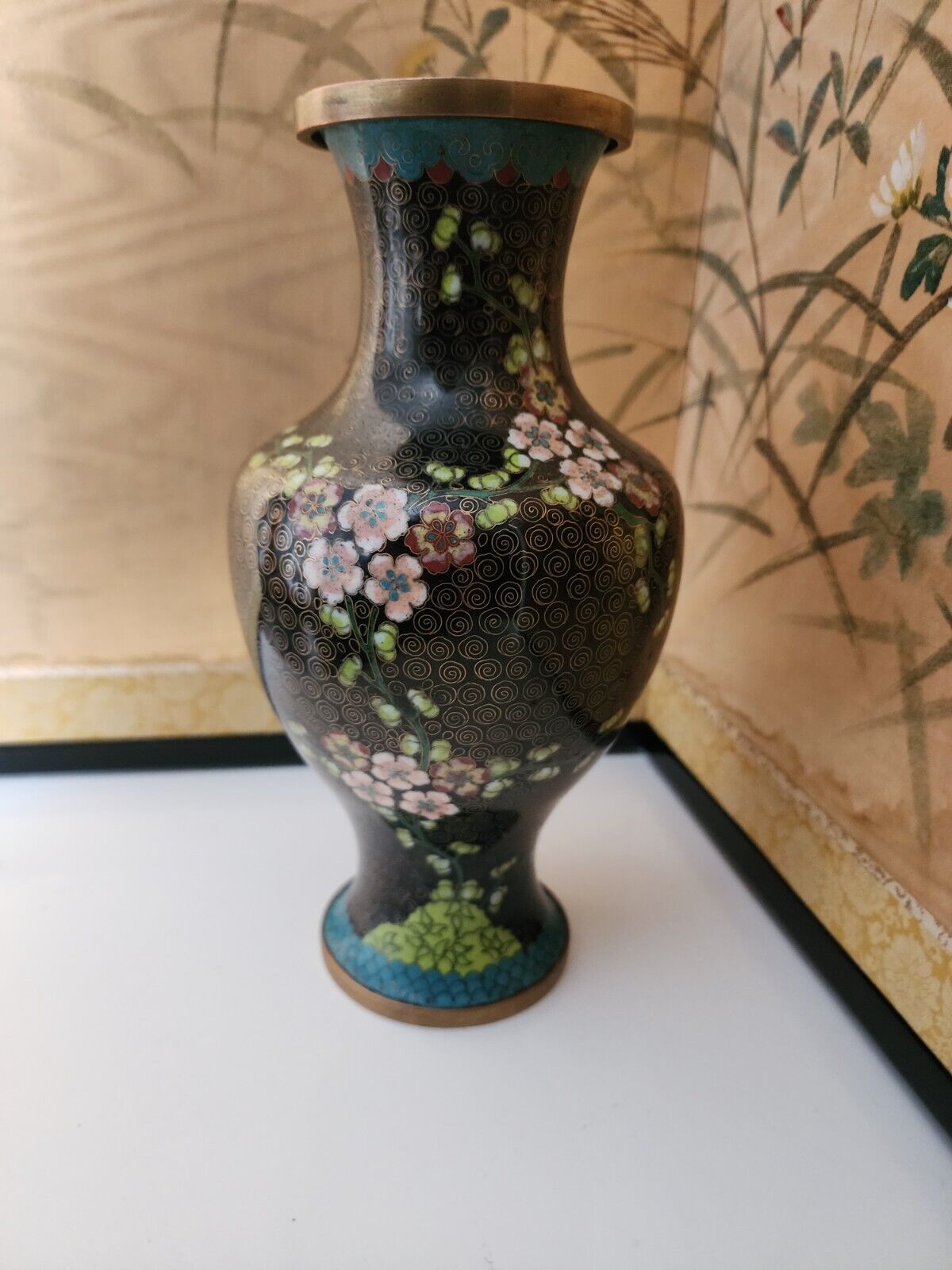 Black well decorated cloisonne vase