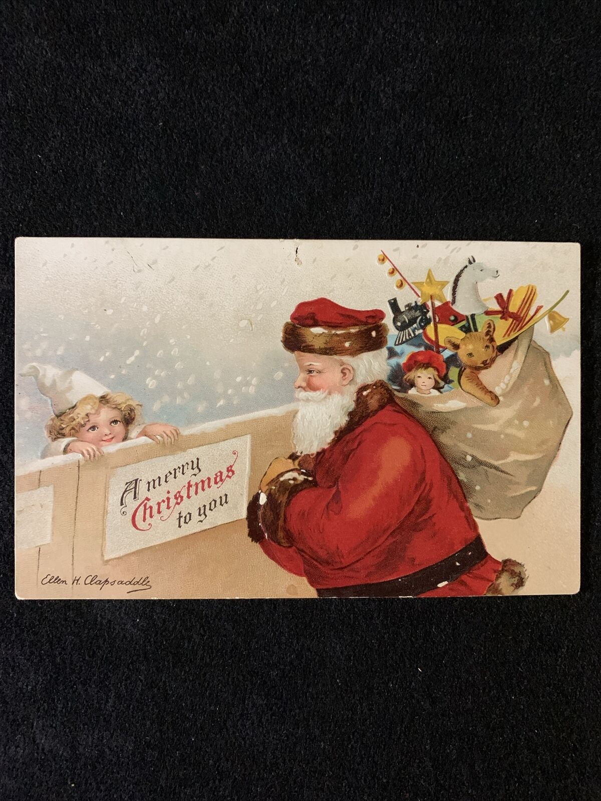Christmas Santa Child Bag Toys Signed Clapsaddle c1910 UNP DB EMB Postcard Snow