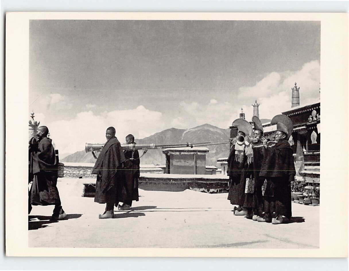 Postcard Monks sounding trumpets on monastery roof, China