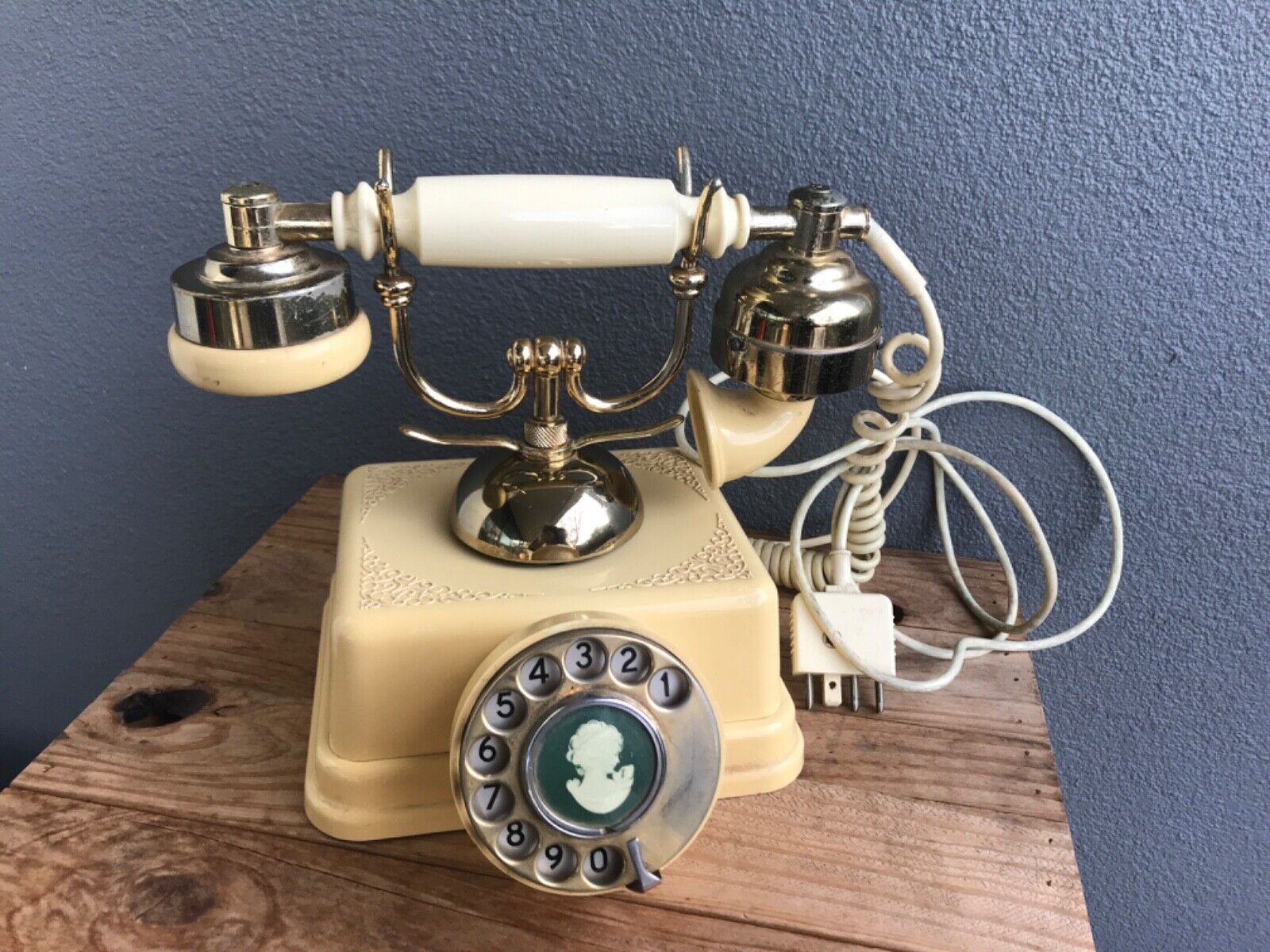 Vintage  antique style rotary desk or table telephone with cameo centre.