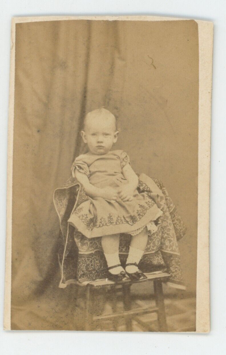 Antique CDV Circa 1870s Adorable Little Girl Sitting in Chair Wearing Cute Dress