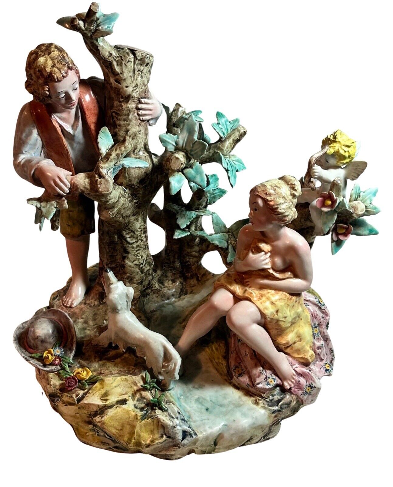 Capodimonte porcelain figurine of boy and girl by a tree exquisite