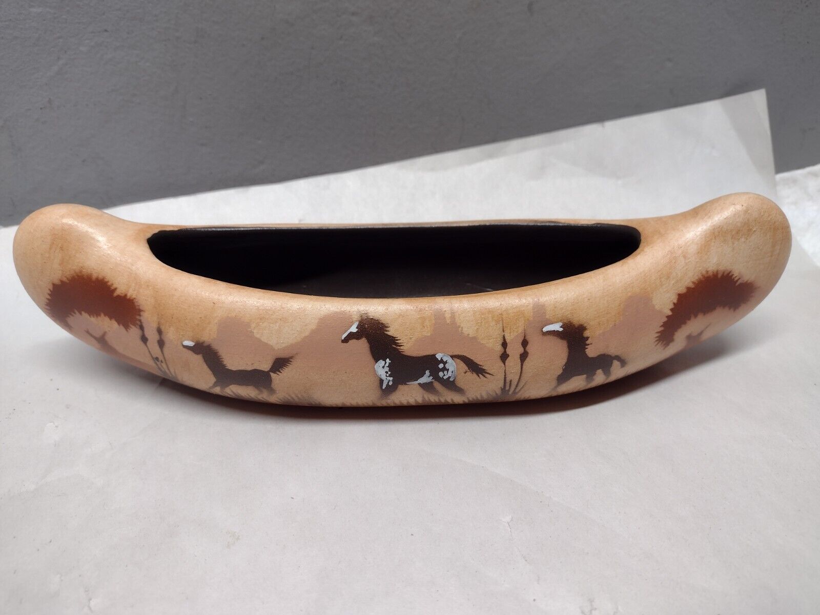 Vintage Navajo pottery Canoe by James Benally,  It has beautiful Horses 