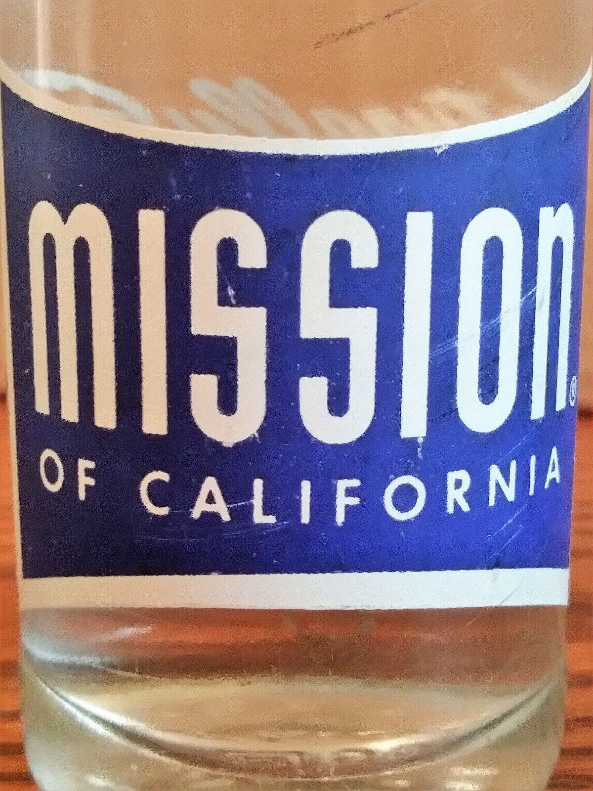 MISSION OF CALFORNIA; ACL SODA POP BOTTLE; 7OZ; BADEN, PA. 1960 (FULL)