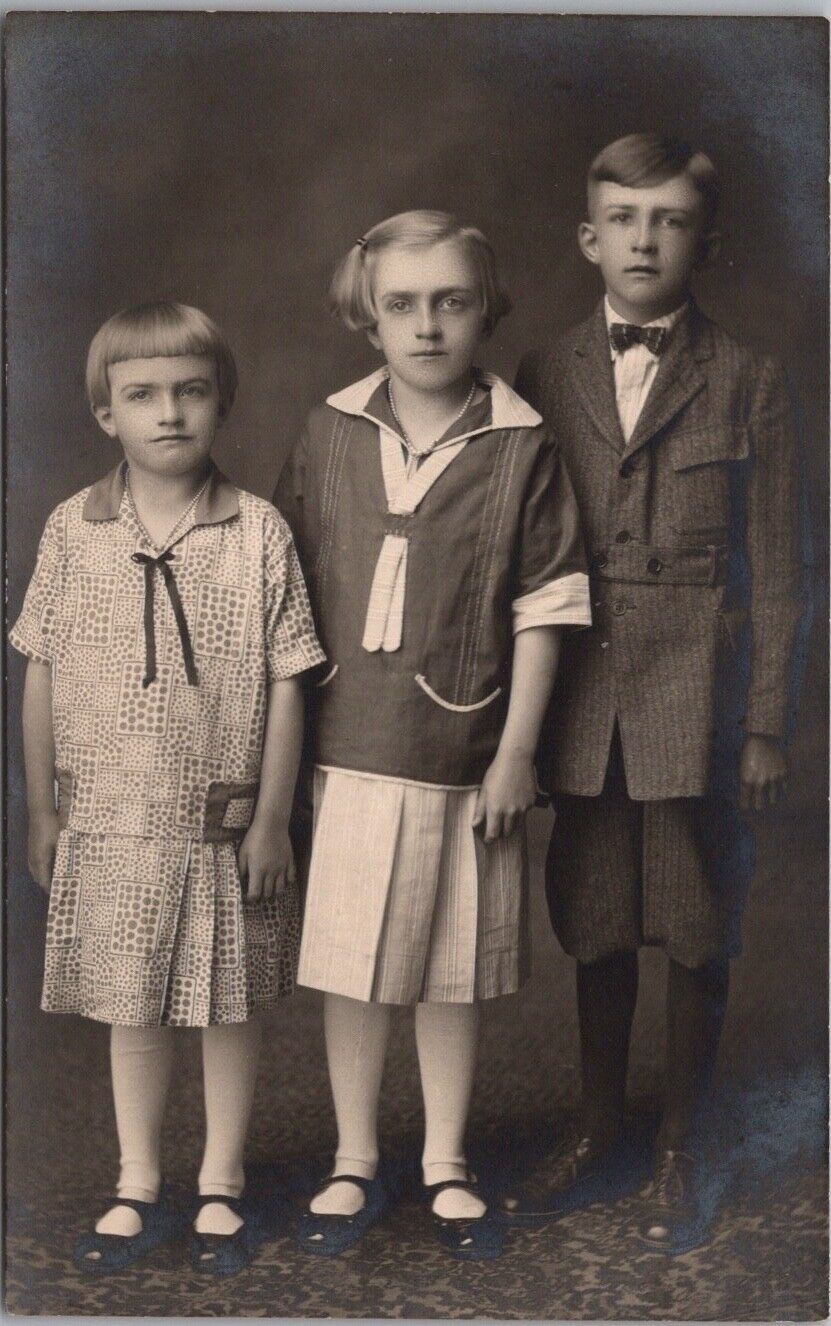 c1910s RPPC Studio Photo Postcard Extremely Serious Children / Siblings - Unused