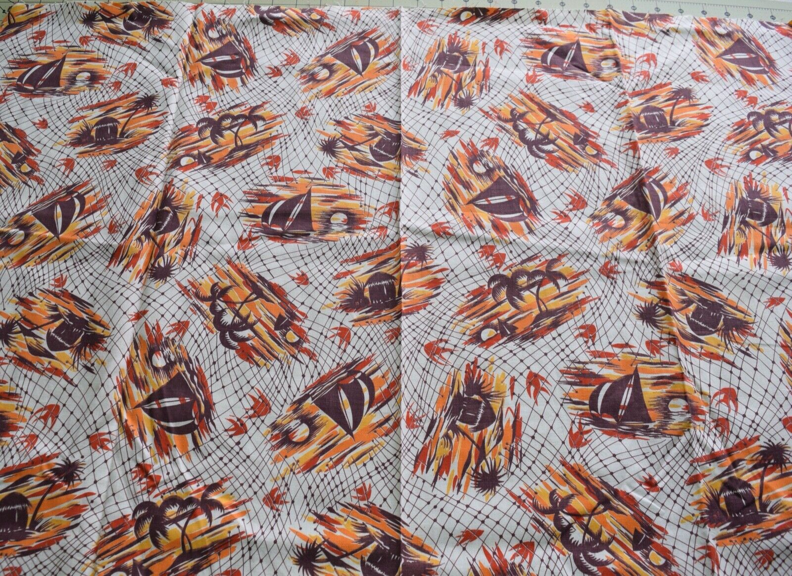 3241  1/2 yd+ Antique 1950's cotton fabric, tropical print in brown/orange