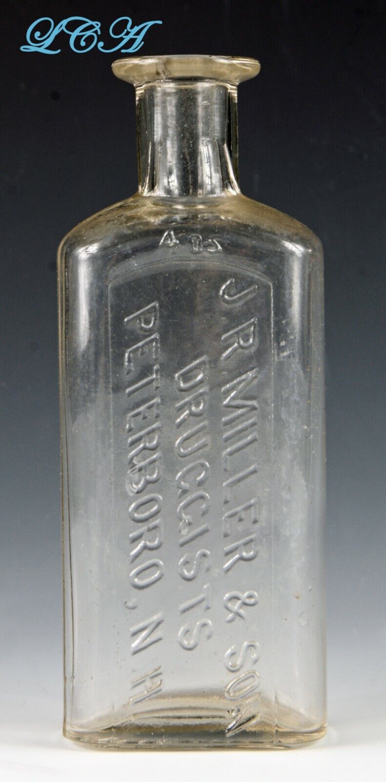 MISTAKE error EMBOSSED antique bottle BACKWARDS LETTER J.R. Miller PETERBORO NH