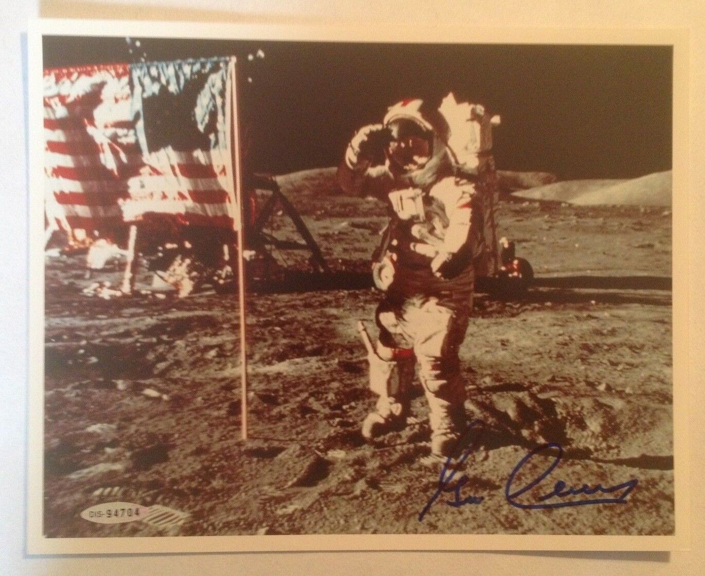 Astronaut Gene Cernan Autographed Photograph on Moon Saluting Flag (Apollo 17)