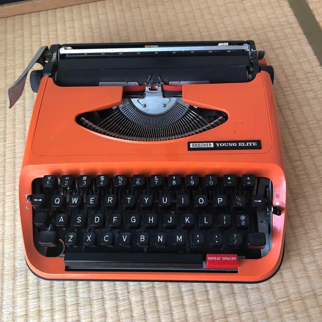 Brother Young Elite Typewriter Retolo Vintage Antique Orange
