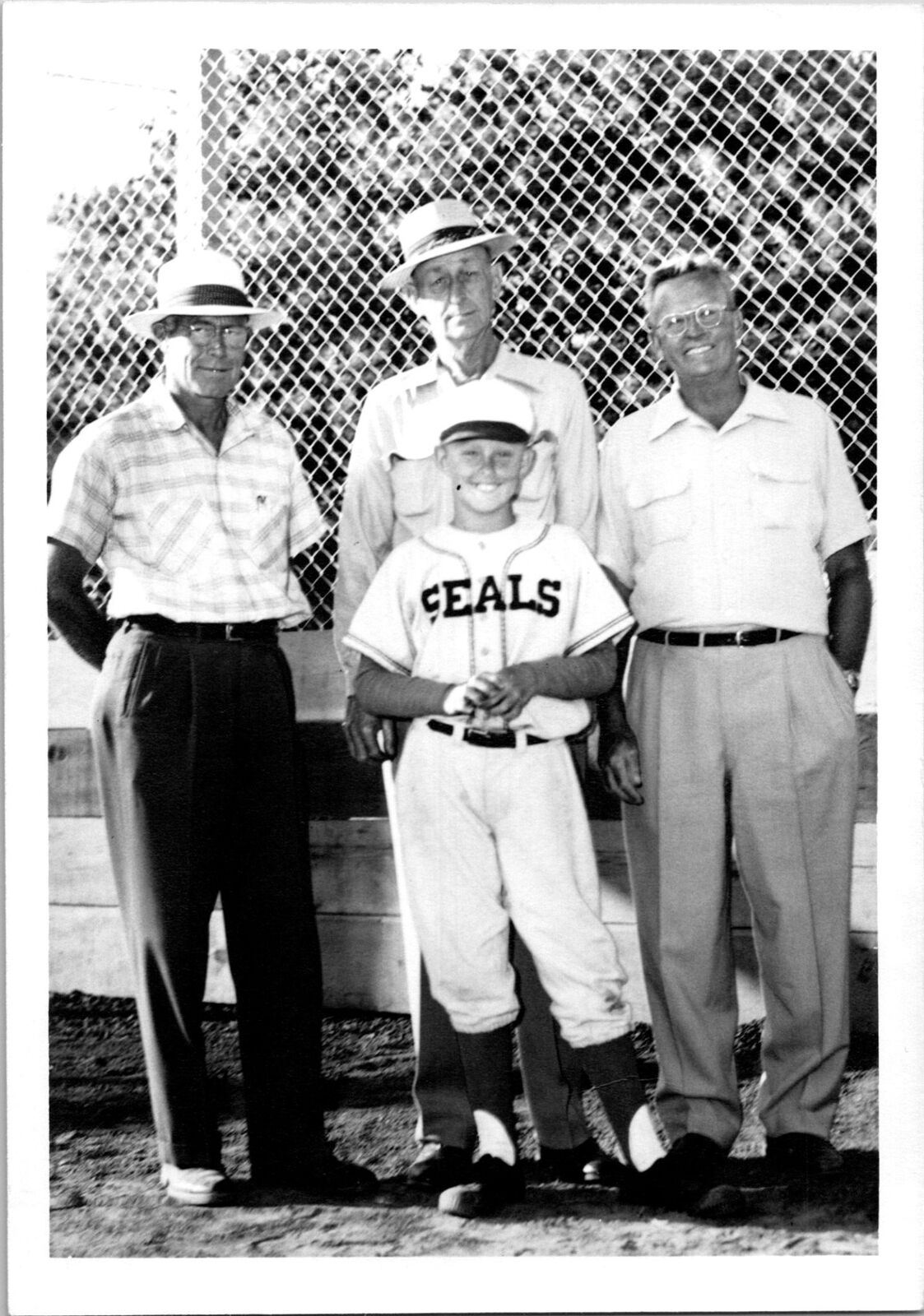  Seals little league player and 3 men taking photo Found Photo V0726