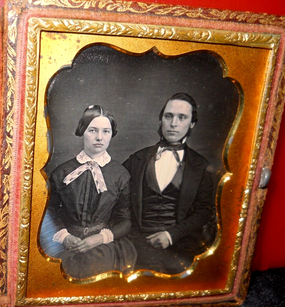 1/6th Size Daguerreotype of young couple in half case