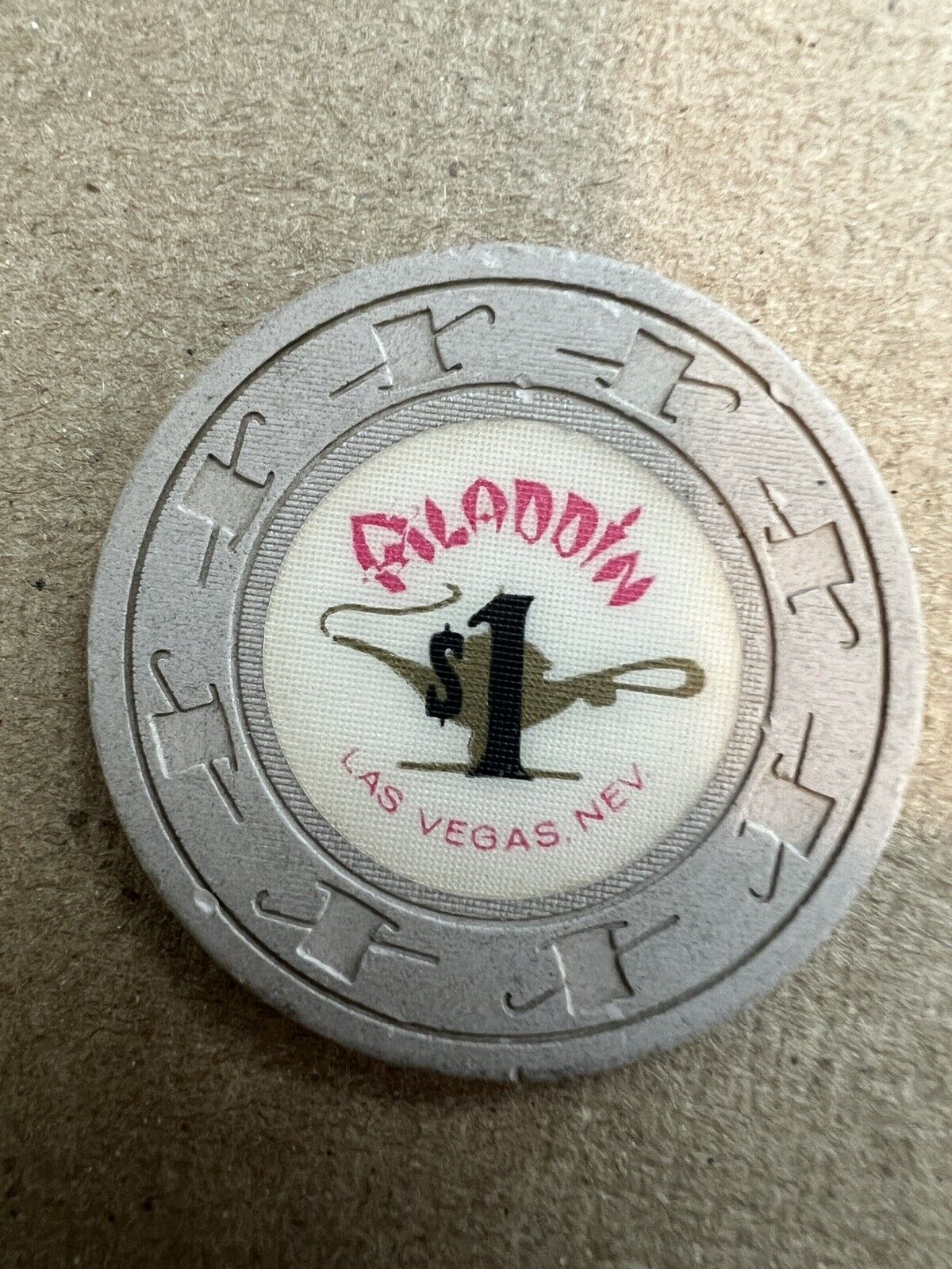 Obsolete $1 chip from the closed Aladdin in Las Vegas