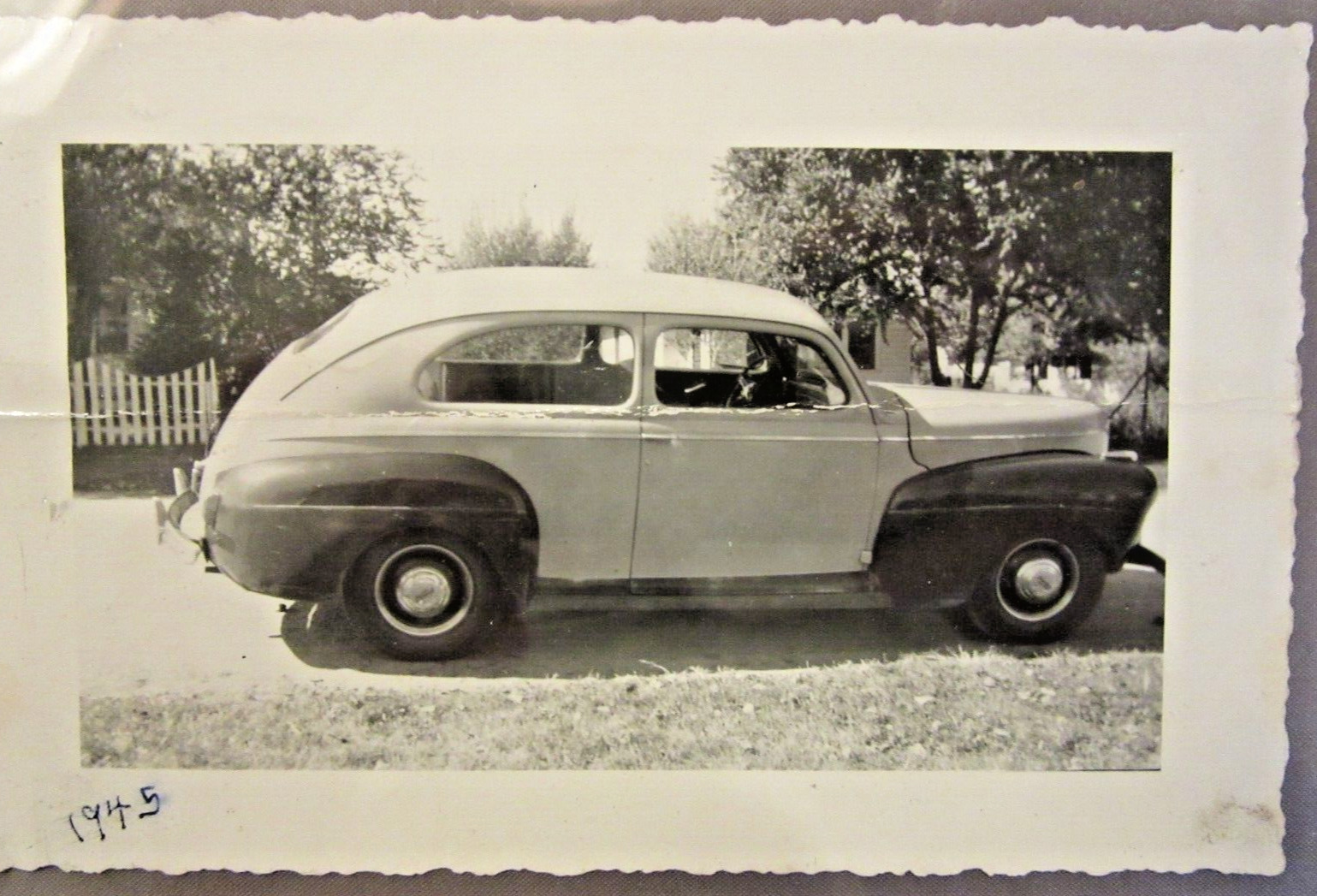 1941 FORD DeLUXE, Two Tone,  2-door Sedan. B&W photo, 5 1/4