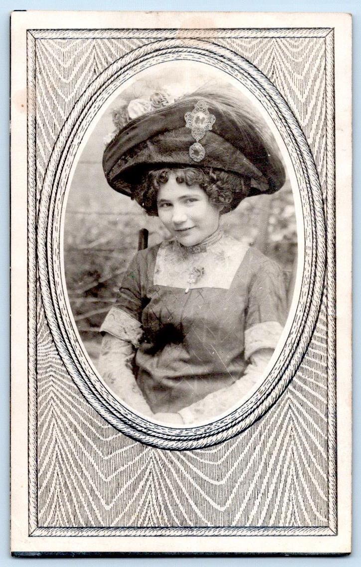 1910 RPPC LARGE FANCY HAT BROOCH PIN PRETTY WOMAN UNUSUAL POSTCARD BORDER FRAME