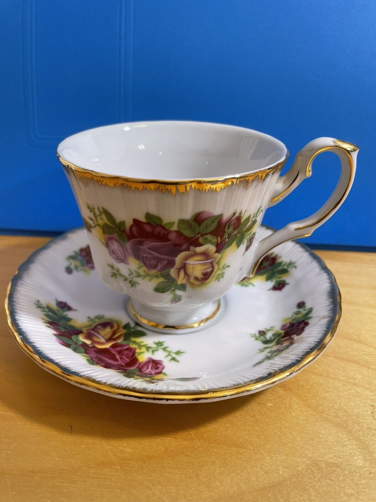 Yusui porcelain cup and saucer 24K GP floral