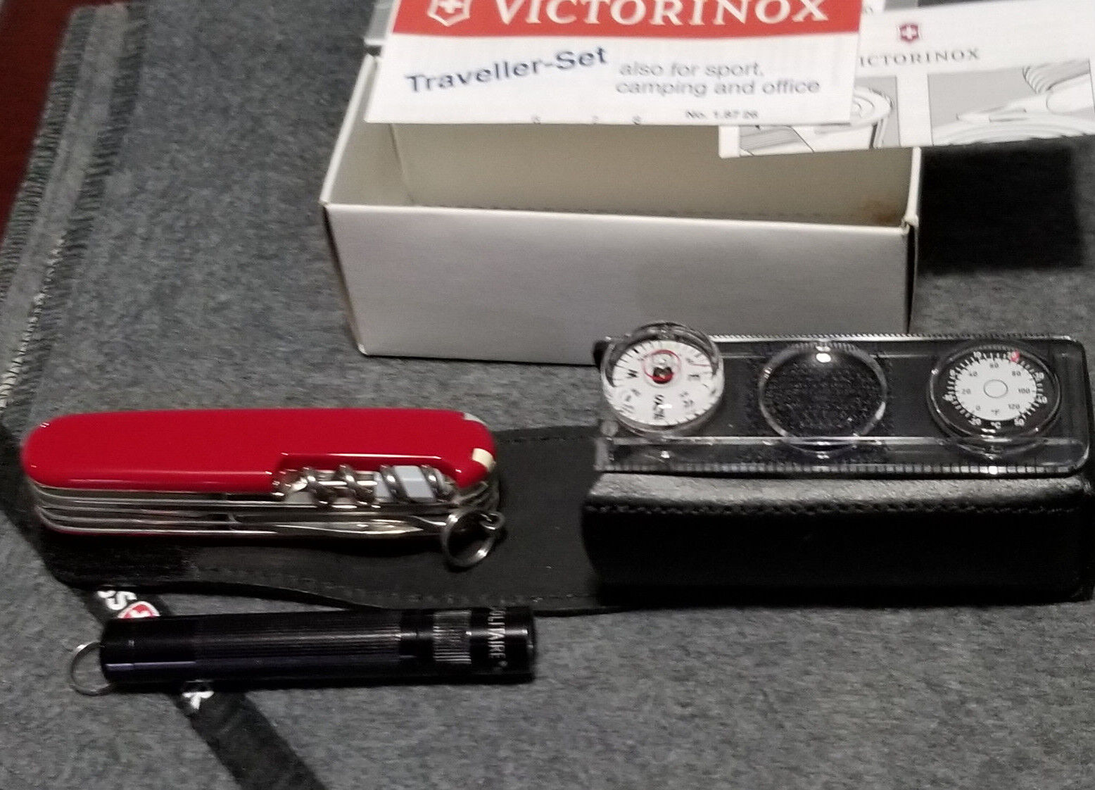 Victorinox rare Traveller set Huntsman+ Leather pouch, multi-tool and light 