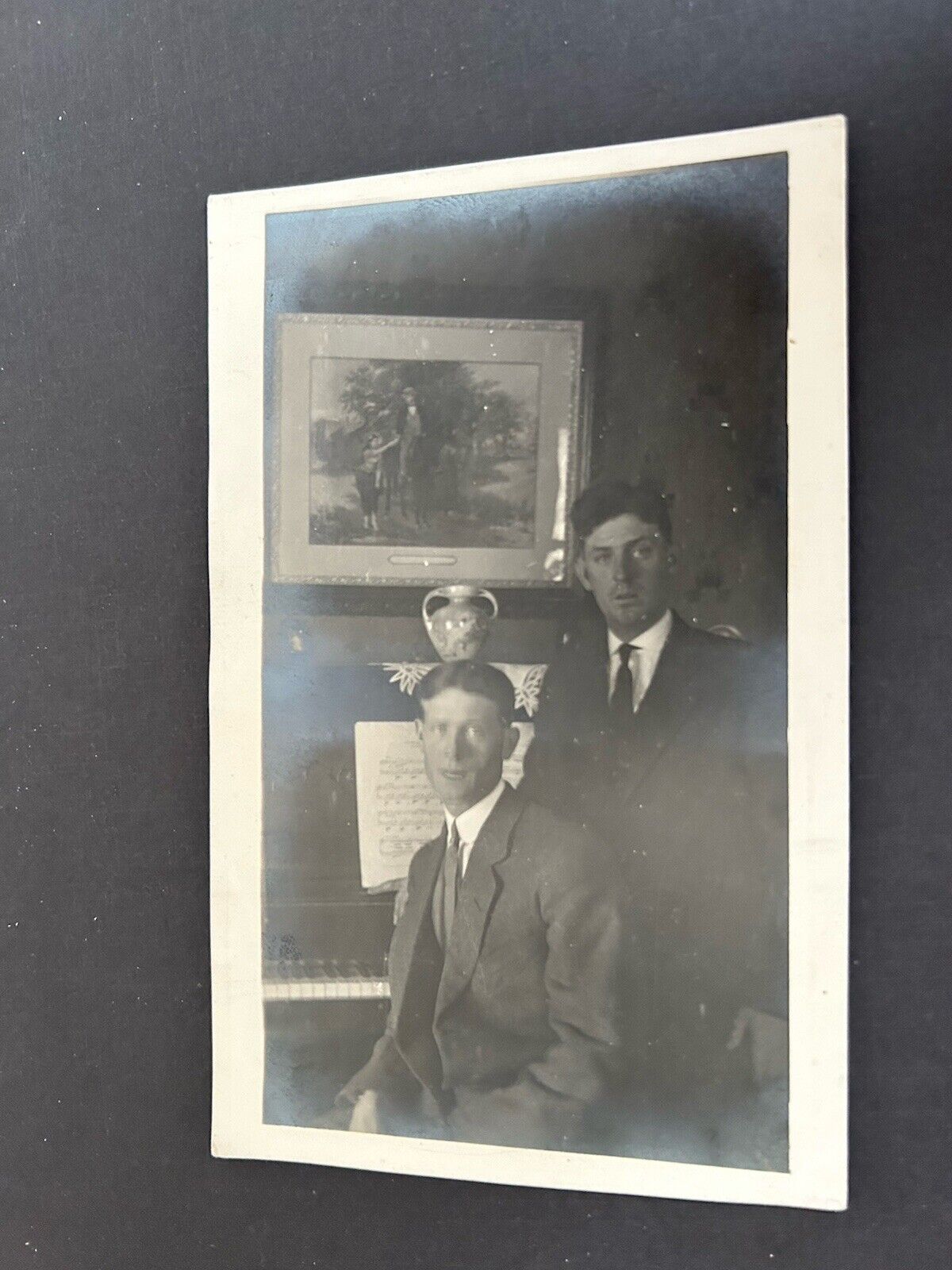 Two Young Men by Piano Interior View RPPC Postcard