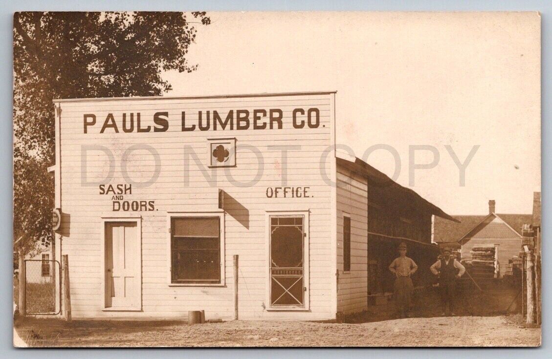 RPPC Sigourney Iowa Postcard Pauls Lumber Co Store Front Washington IA Schultz