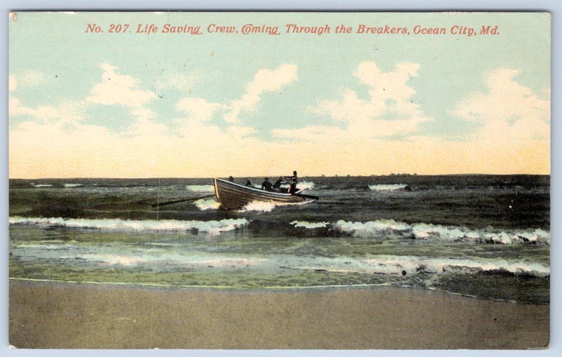 1910's OCEAN CITY MD LIFE SAVING CREW BOAT COMING THROUGH THE BREAKERS POSTCARD