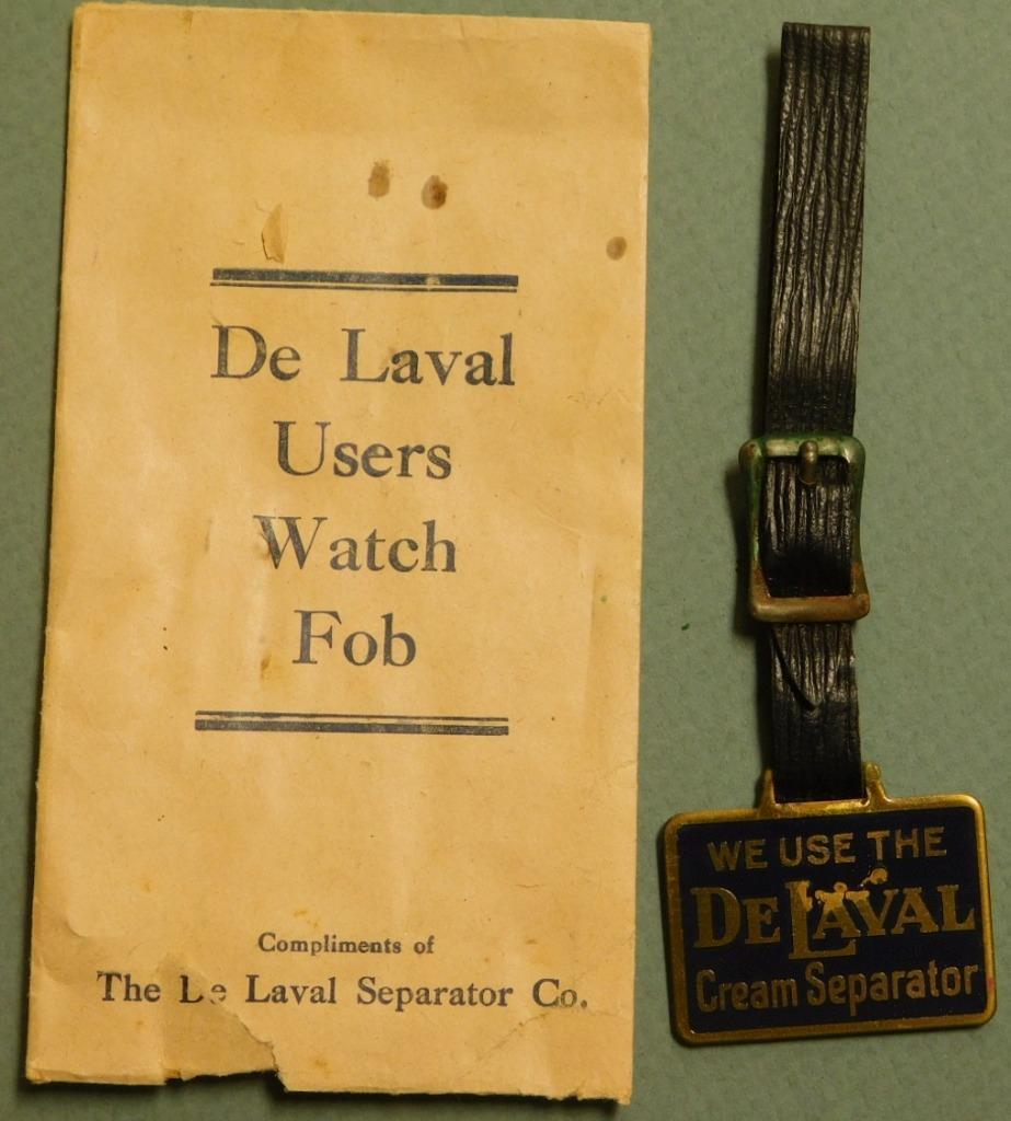 De Laval New Old Stock Dark Blue Enamel Watch Fob with Original Envelope Tray 24