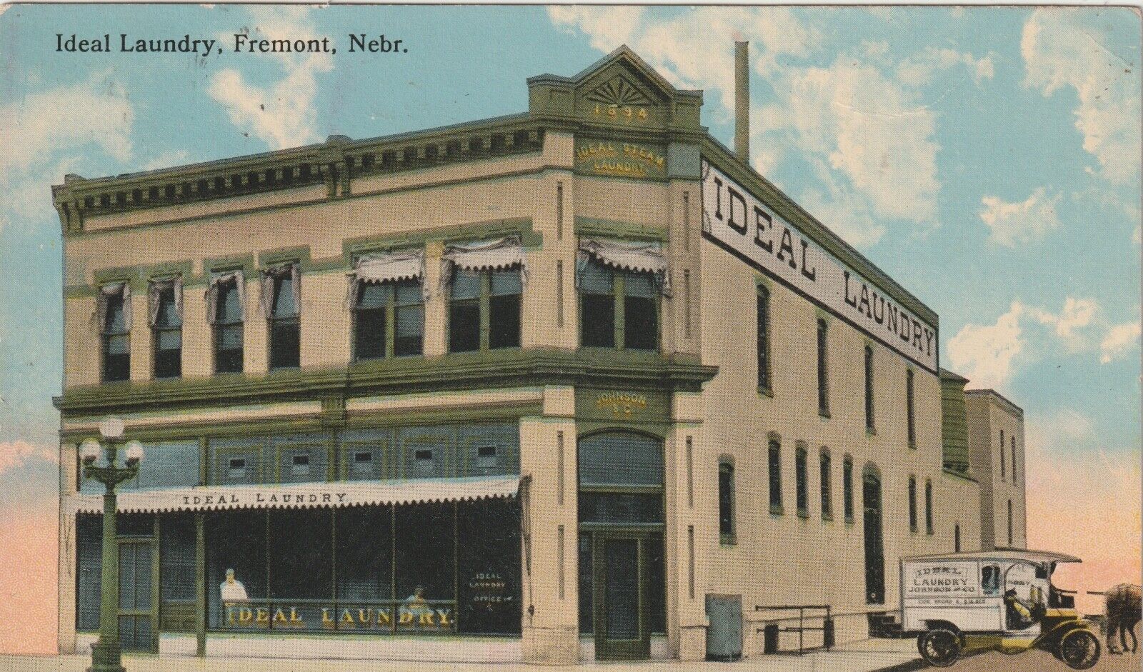 FREMONT, NEBRASKA POSTCARD Ideal Laundry Building Signs 1915, Delivery Wagon