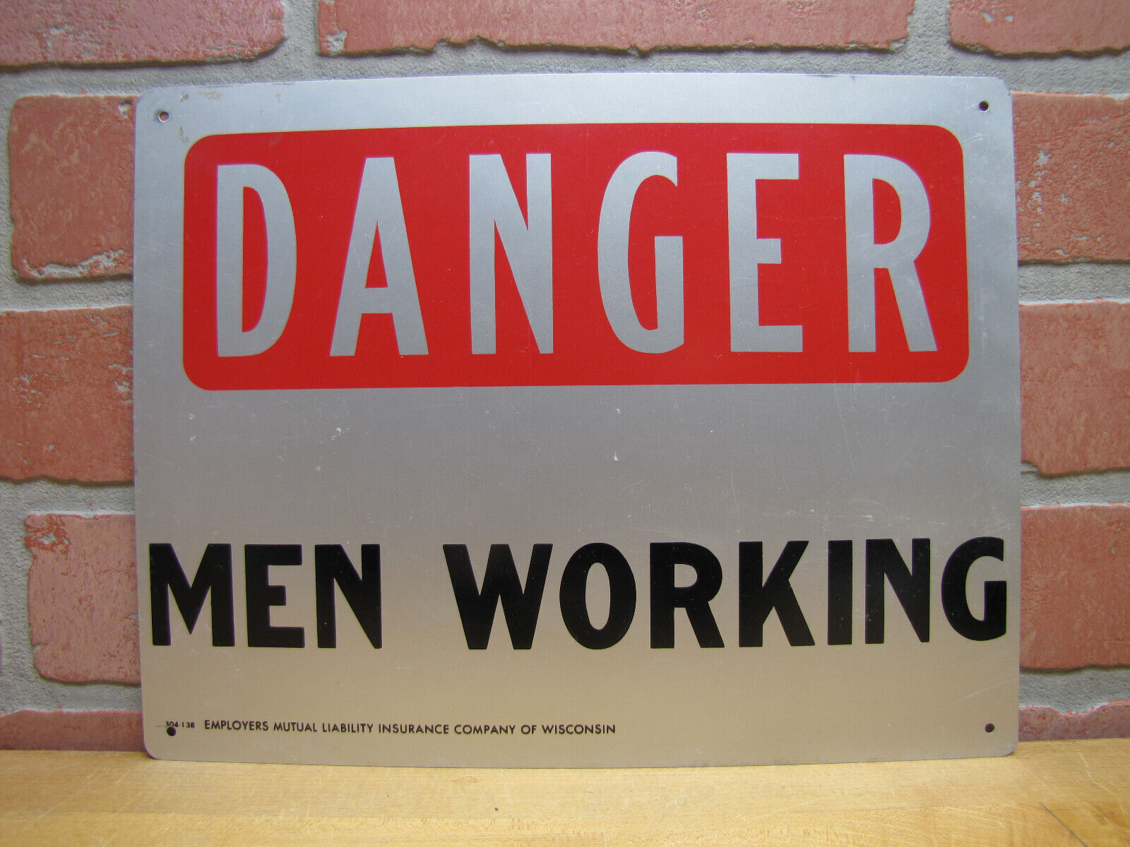 DANGER MEN WORKING OLD SIGN EMPLOYERS MUTUAL LIABILITY INSURANCE CO OF WISCONSIN