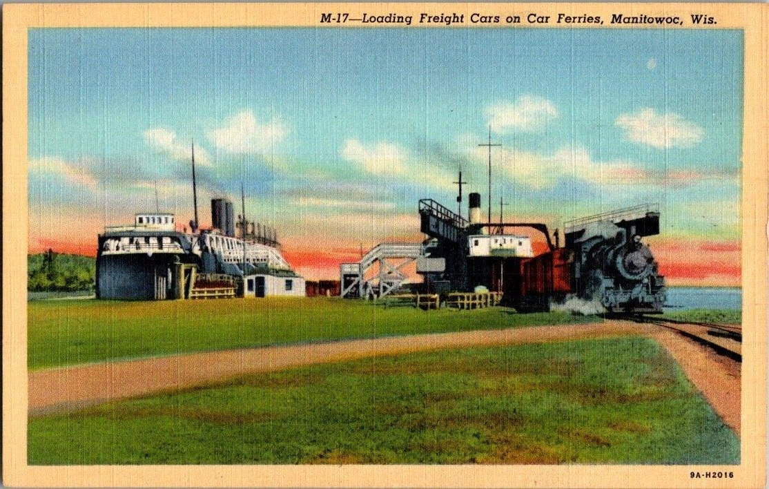 1940\'S. MANITOWOC, WISCONSIN. LOADING FREIGHT CARS ON CAR FERRIES. POSTCARD WA14