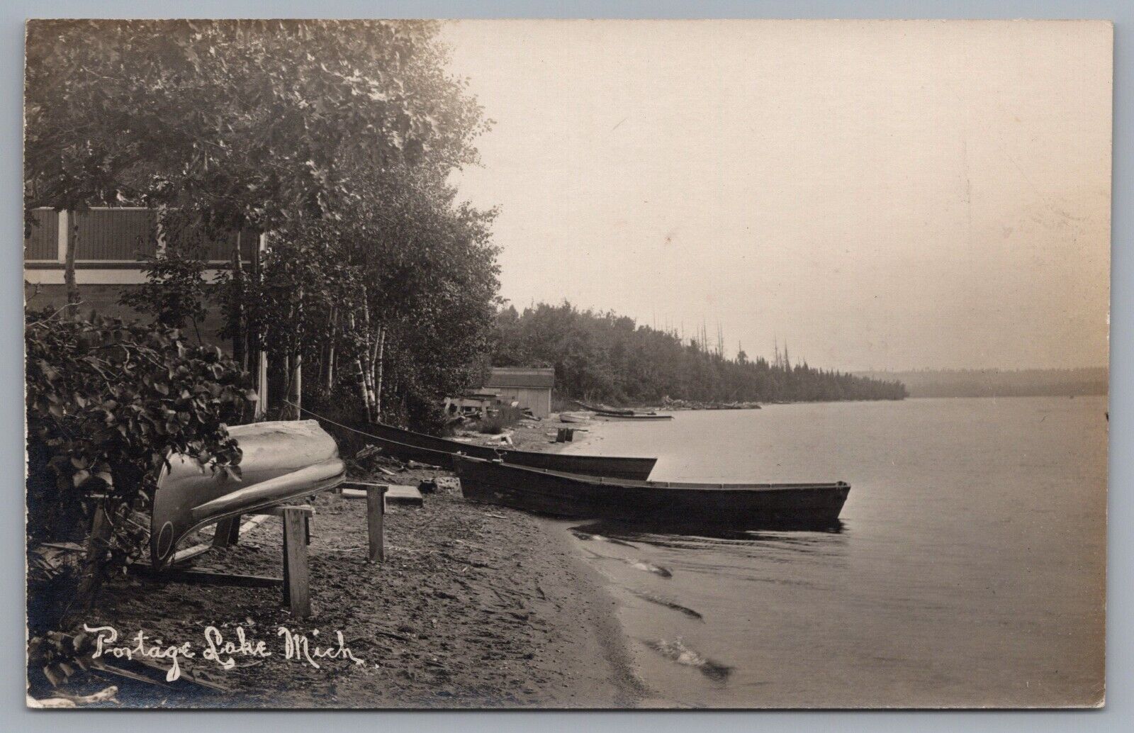 Portage Lake Michigan Canoes On The shore RPPC Real Photo Postcard