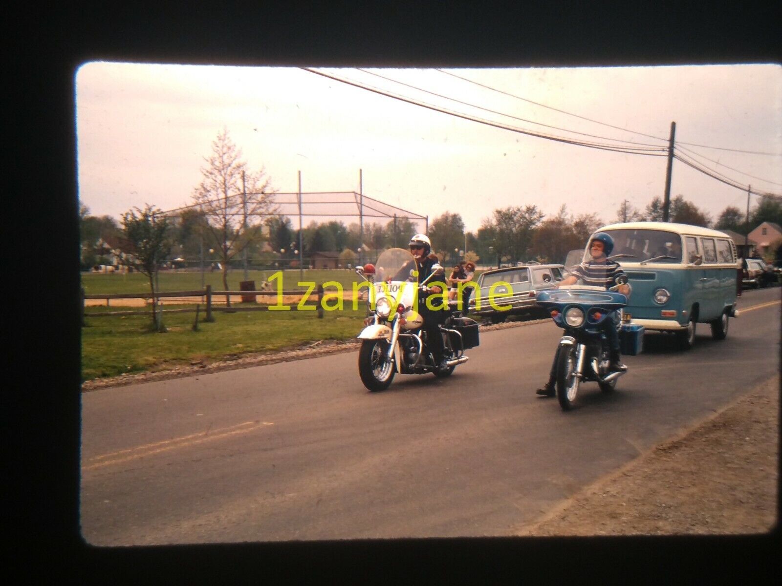 3L05 VINTAGE Photo 35mm Slide COP AND MAN ON MOTORCYCLE LEADING VOLKSWAGON VAN