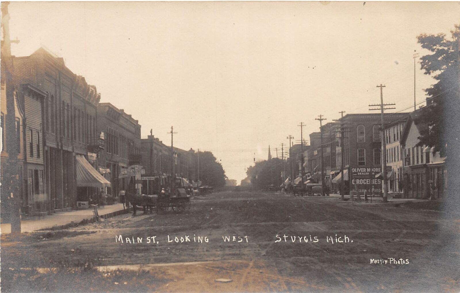 J36/ Sturgis Michigan RPPC Postcard c1910 Main Street Stores West 259