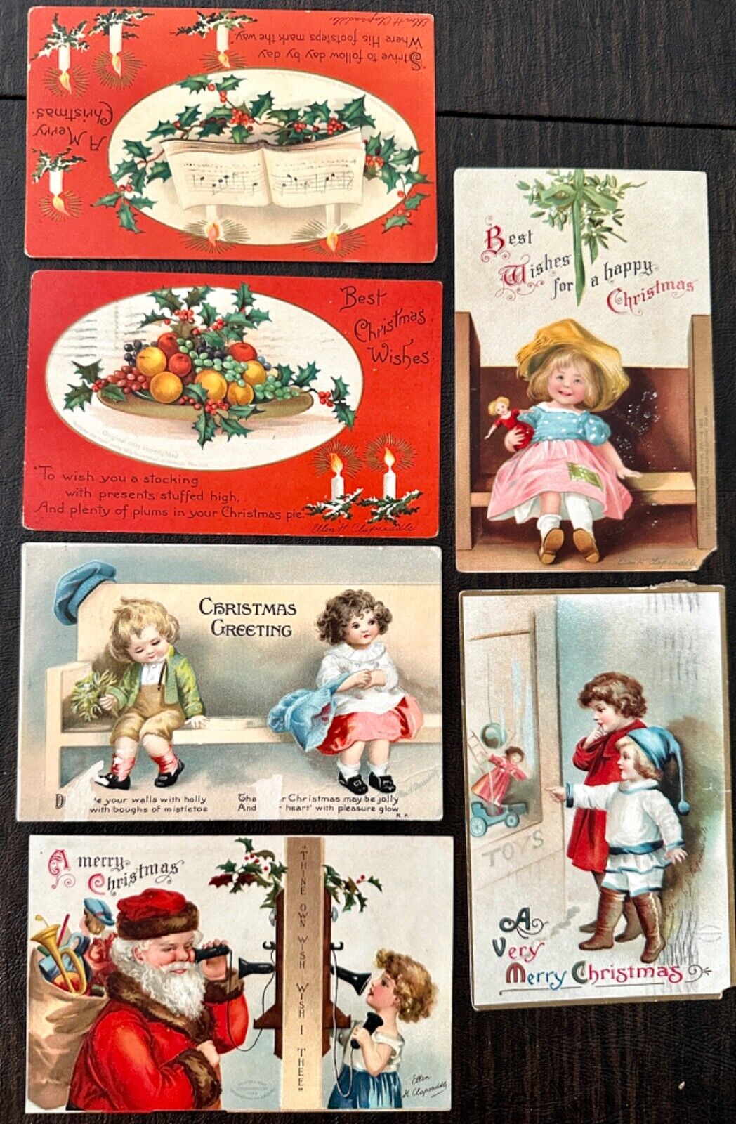 6 Antique Christmas embossed postcards ca 1910 with Ellen Clapsaddle signatures