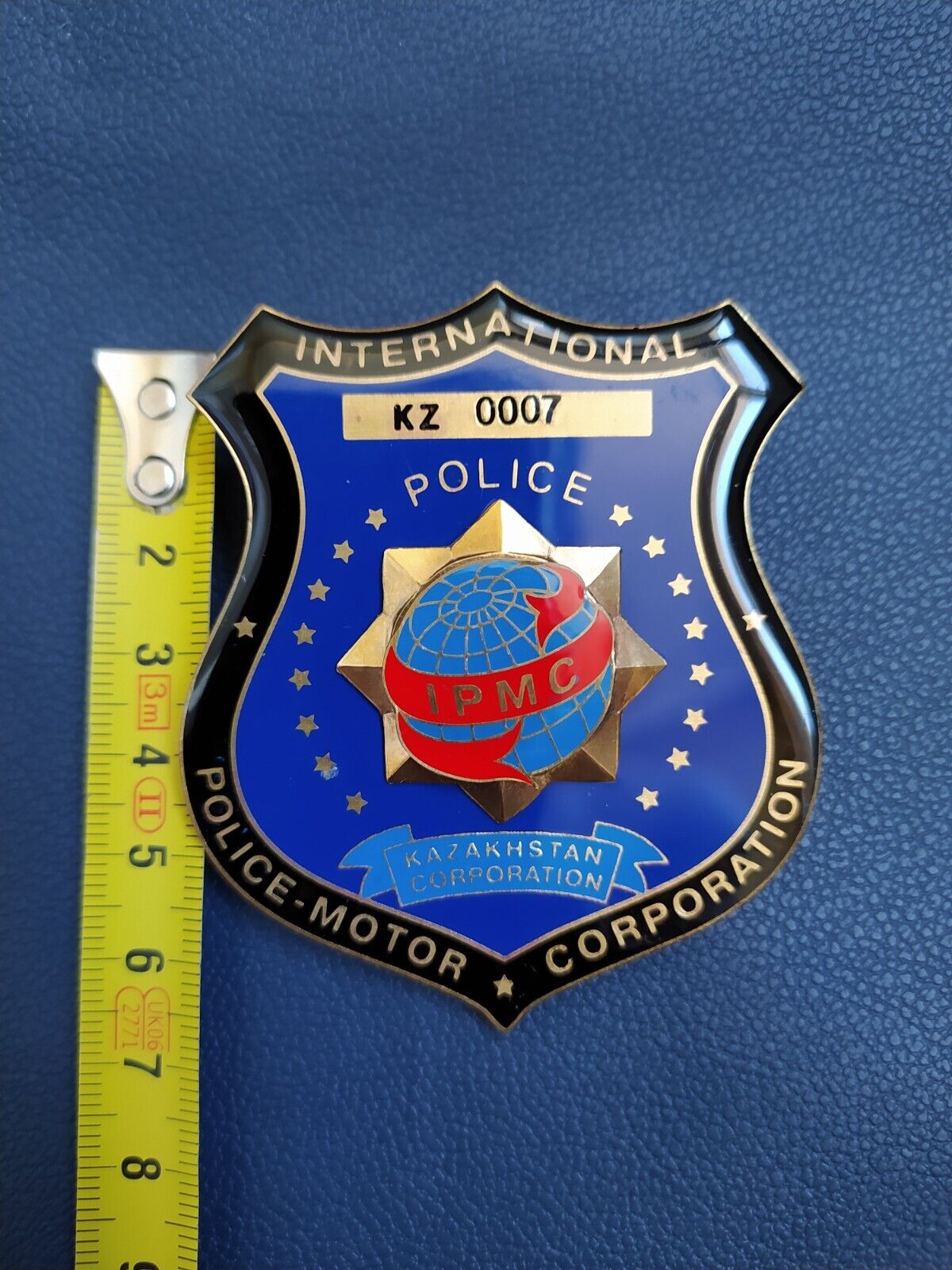 Kazakhstan INTERNATIONAL POLICE Corporation  badge police motor RARE   IPMC