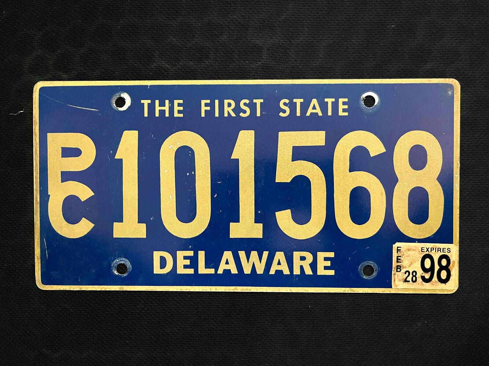 1998 Delaware License Plate PC101568   THE FIRST STATE, BEAUTIFUL YELLOW ON BLUE
