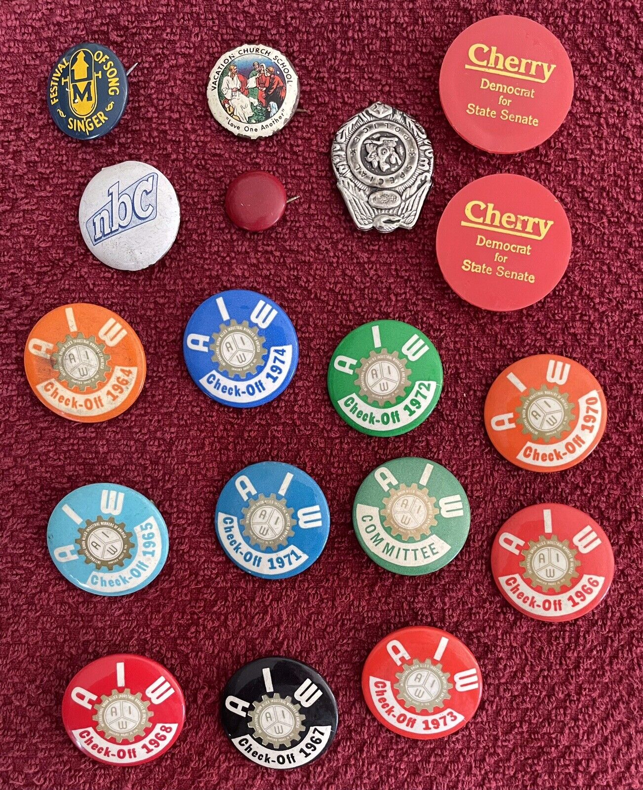A.I.W. Pinbacks…Lot Of 11…and More