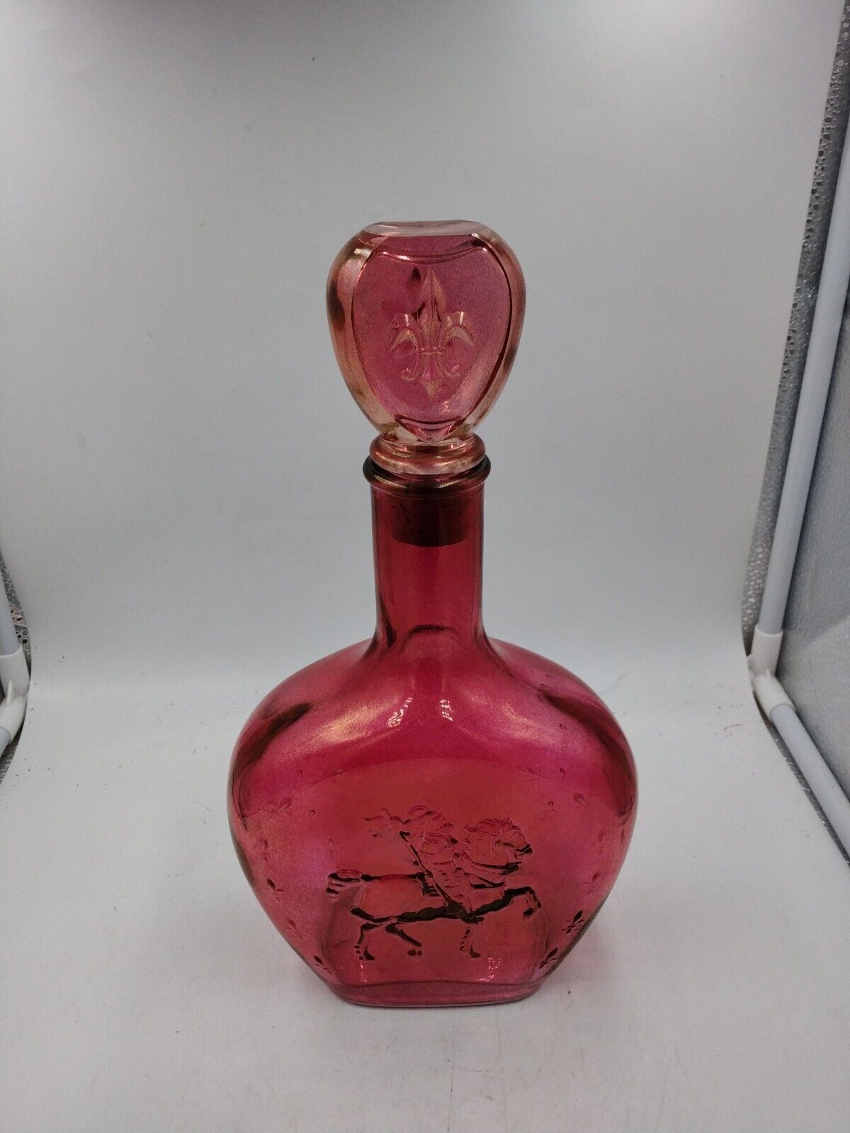 Vintage Red/ pink Liquor Glass Bottle Embossed Knight On Horse w stopper Empty