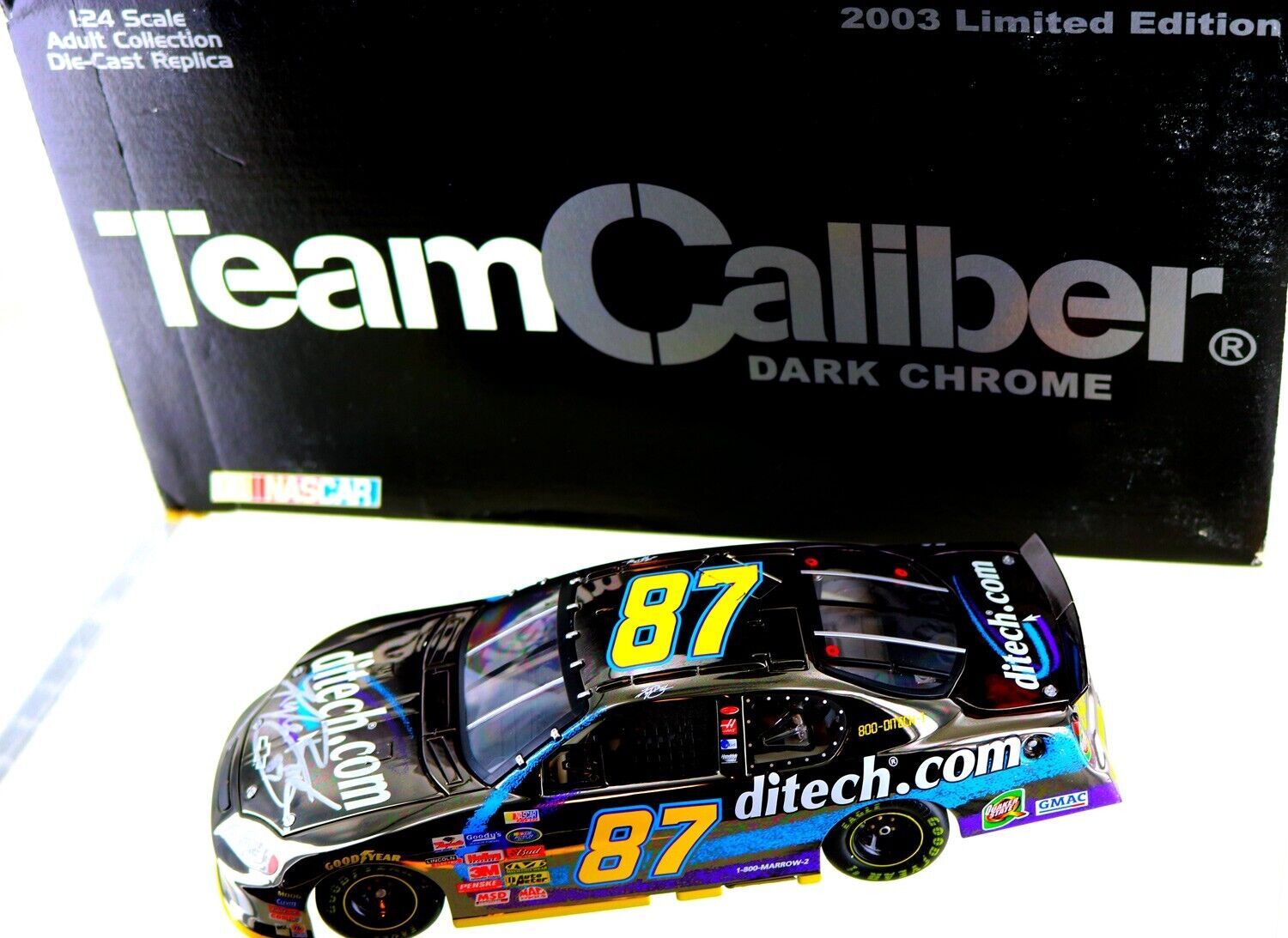 Kyle Busch #87 Ditech.com 2003 Monte Carlo scale 1-24th Dark Chrome. Autographed