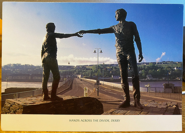 Irish Postcard DERRY HANDS ACROSS THE DIVIDE Statue Londonderry Northern Ireland