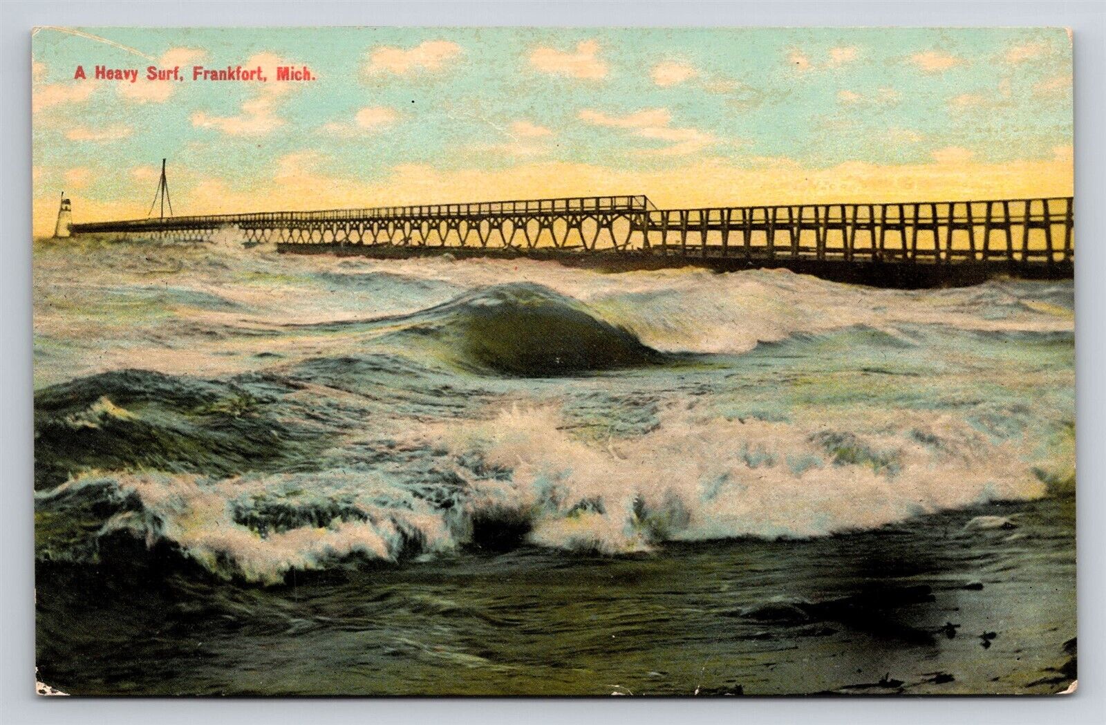Frankfort MI Heavy Surf at Pier w/ Lighthouse in the Distance Old Postcard 1910s
