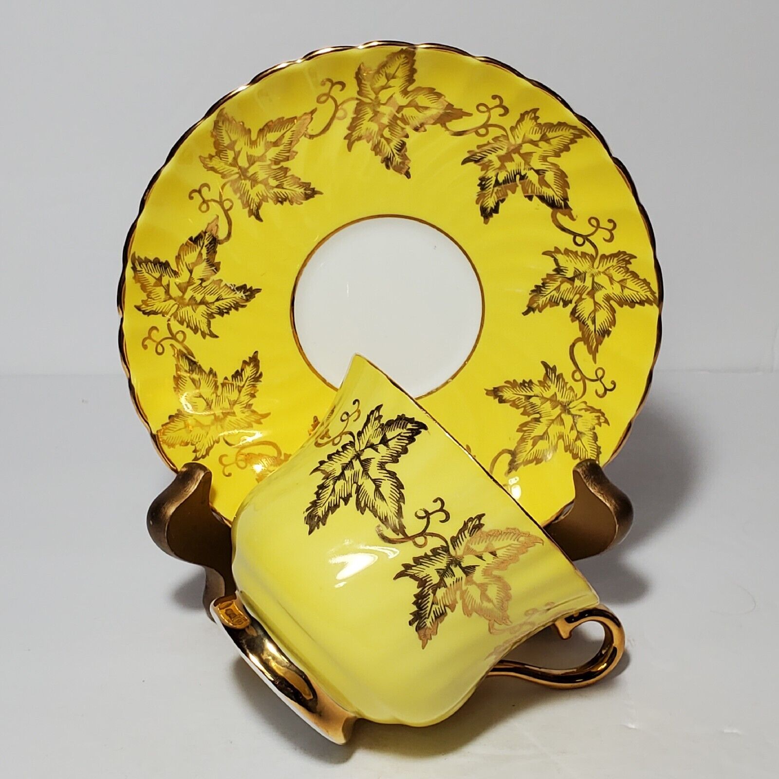 Sutherland H&M Teacup and Saucer Yellow Gold Leaves Bone China England Vintage