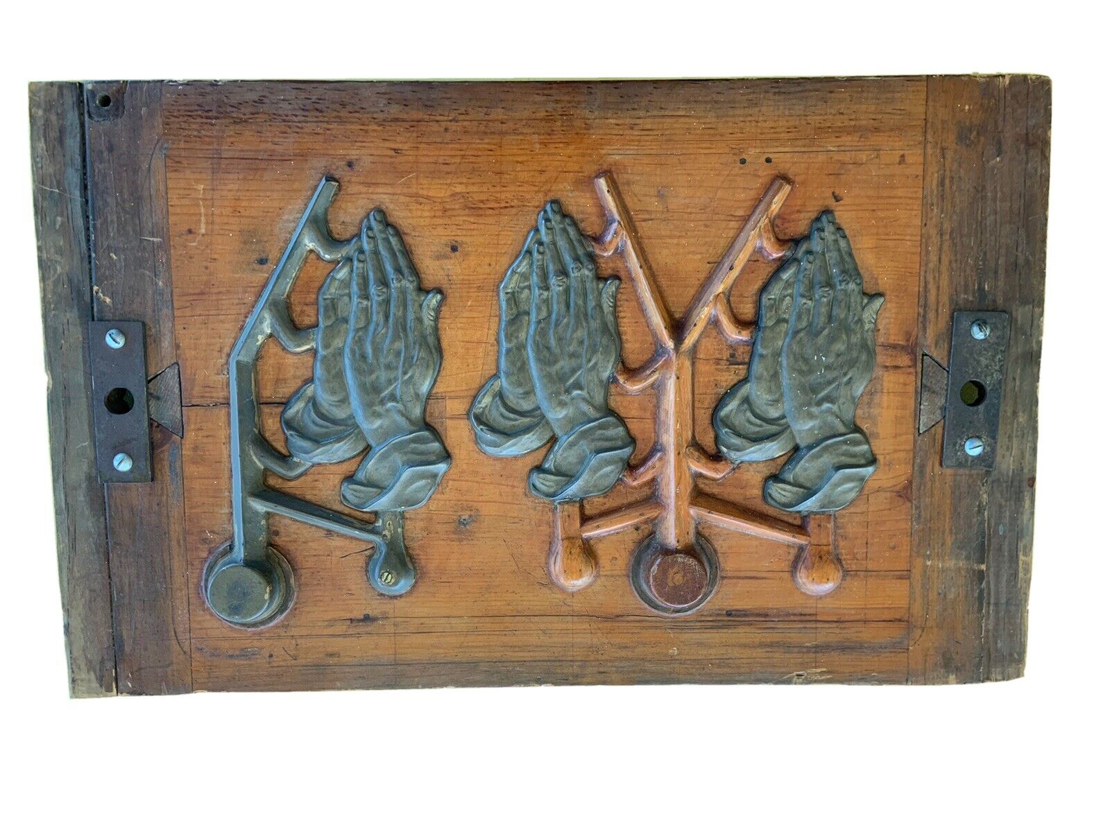 antique praying hands wooden architectural panel altar anthropology Mormons