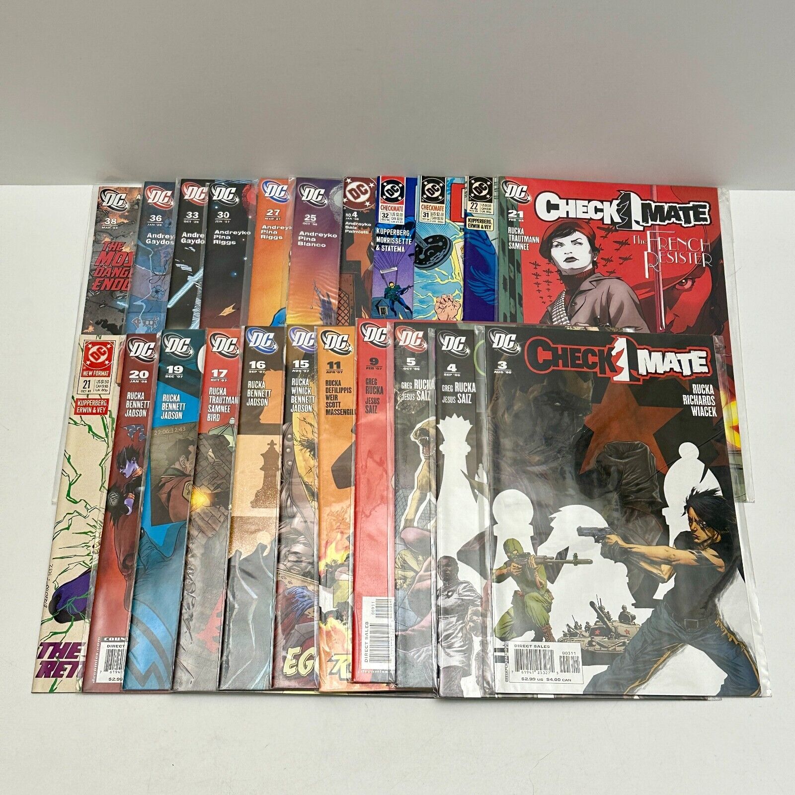 Lot of 22 DC Comic Books: Checkmate and Manhunter