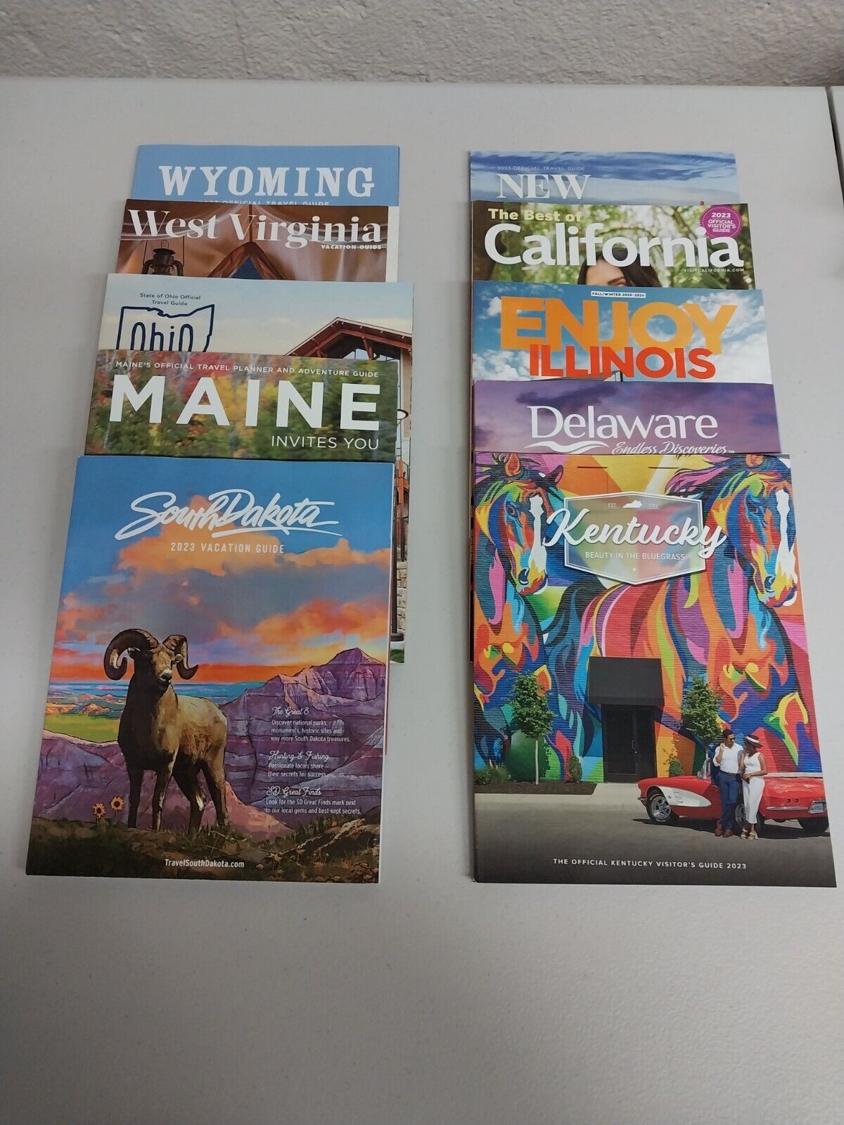 Ten (10) Official State Travel Guides CA, DE, IL, KY, ME, NJ, OH, SD, WV and WY