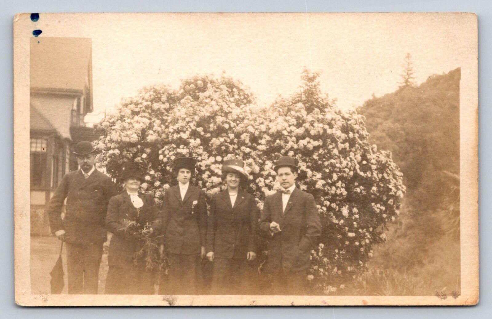 RPPC Well Dressed People Flowering Shrub House Real Photo P621 Unknown Location