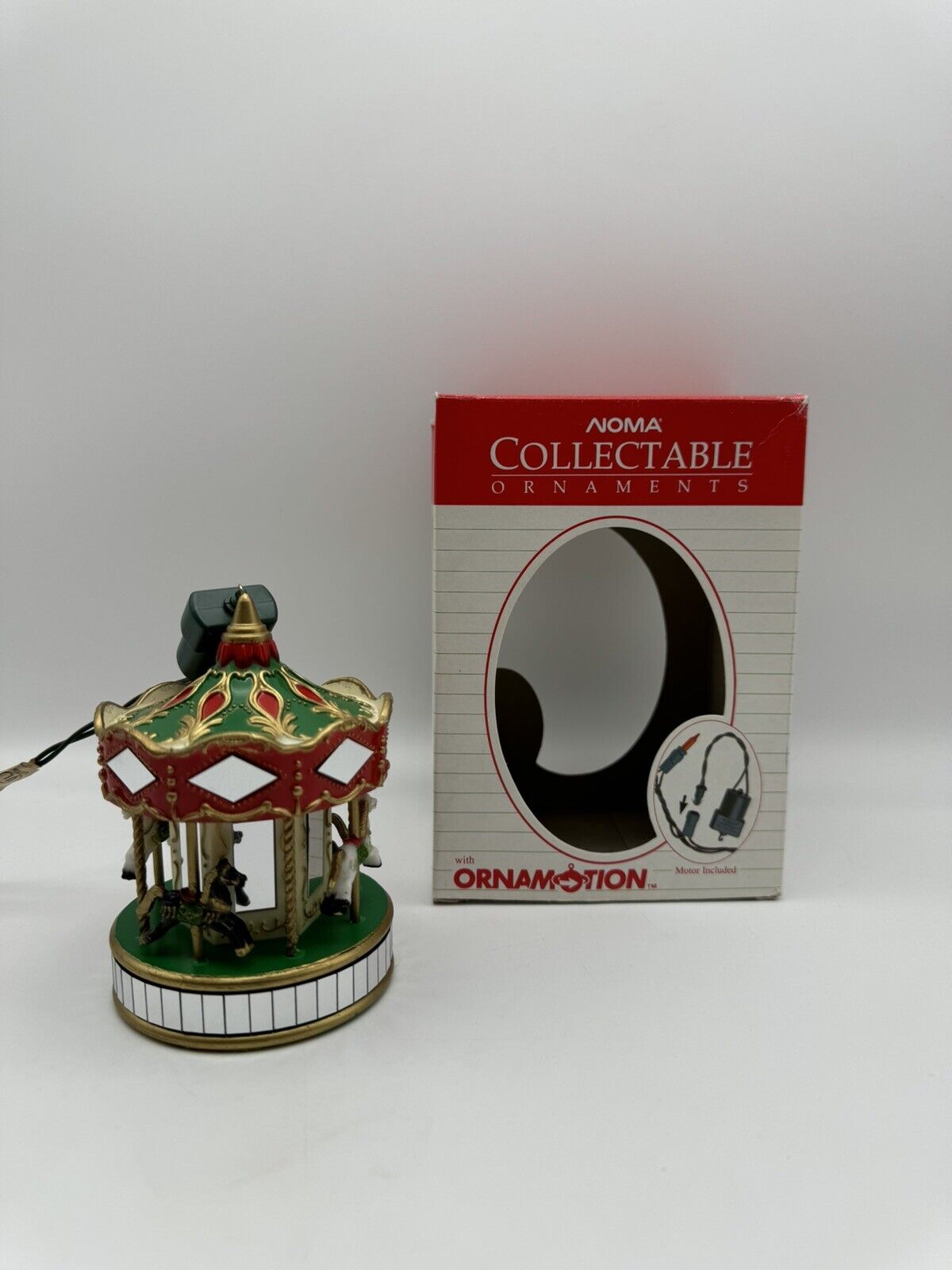 NOMA Ornamotion Rotating Collectable Carousel Christmas Ornament