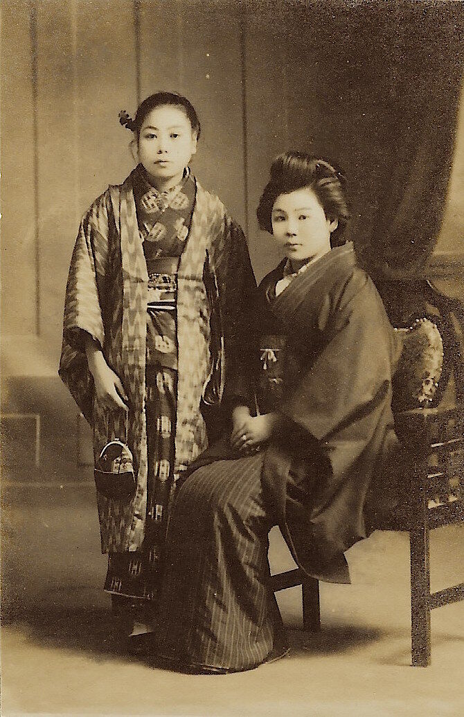 PORTRAIT OF TWO JAPANESE SISTERS CLAD IN KIMONOS